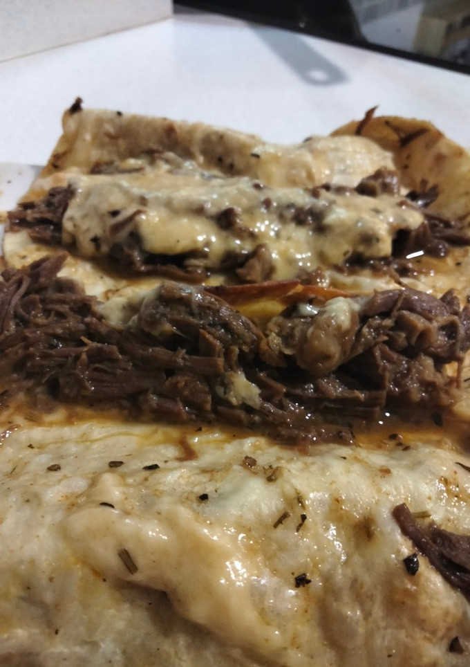 Una foto de Tacos de ternera con queso fundido