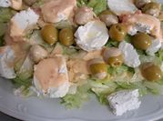 Una foto de ensalada de papaya y queso