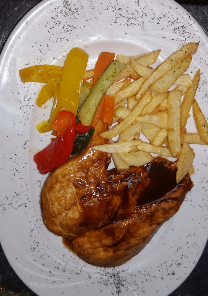 Una foto de Pollo jengibre 