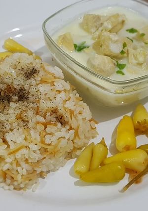 A picture of Chicken Shakriyeh with rice.