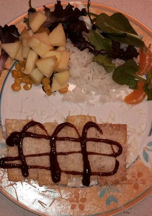 Una foto de Tofu salteado con grana padano y salsa barbacoa