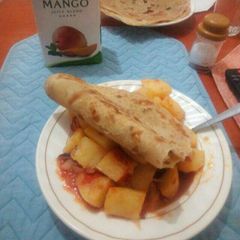 A picture of Stewed potatoes served with chapo.