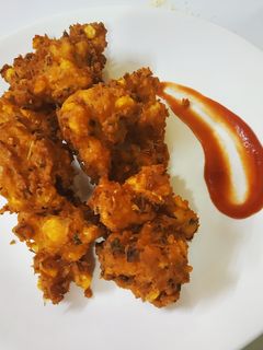 कुरकुरीत कॉर्न पकोडा (corn pakoda recipe in marathi) रेसिपी चे मुख्य फोटो
