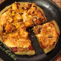 A picture of Palak Paneer Pizza.