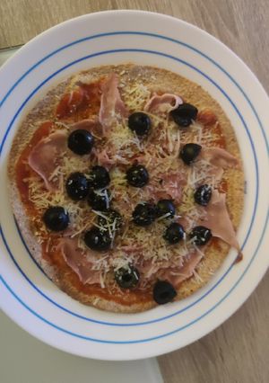 Una foto de Pizza con tortita de trigo integral