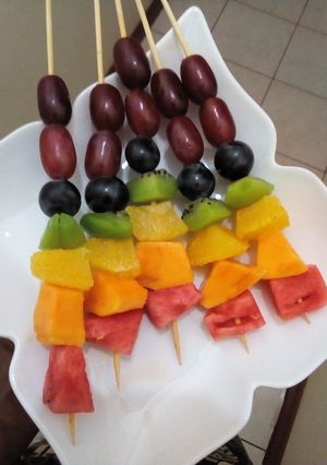 A picture of Rainbow fruit skewers.