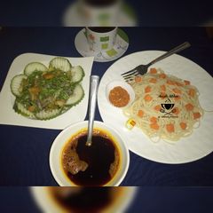 A picture of Spag with palm oil and vegies.