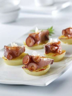 A picture of Octopus with potato and sea salt.