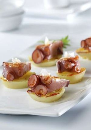 A picture of Octopus with potato and sea salt.