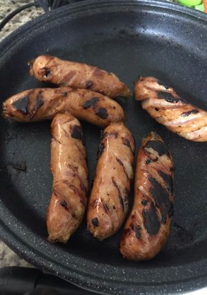 Una foto de Chorizo santarrosano asado con cerveza