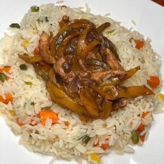 A picture of Vegetable rice and chicken stir fry.