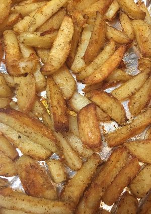 A picture of Oven fried Parmesan potatoes.