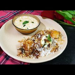 A picture of Nawabi Egg Biryani.
