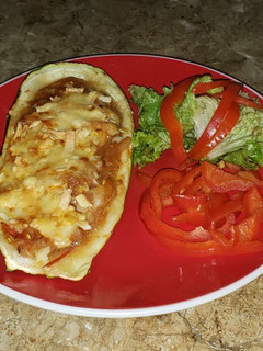 Una foto de Calabacín relleno con boloñesa