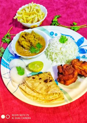 A picture of Dal Gosht instant chicken 65 Thali.