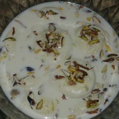 A picture of Rasmalai with milk powder.
