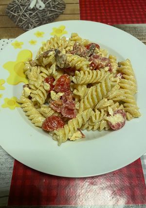 A picture of Cold Pasta with Stracciatella, Cherry Tomatoes, and Guanciale 🤩.