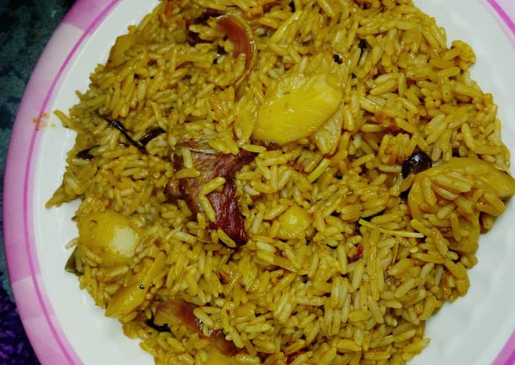 Simple Way to Prepare Homemade Jollof rice with potato and meat
