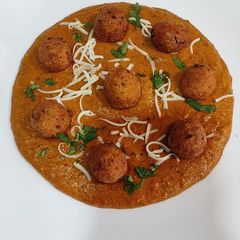 A picture of Cheese Angoori Kofta Curry.