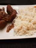 Cochino o puerco al vino y cebollas