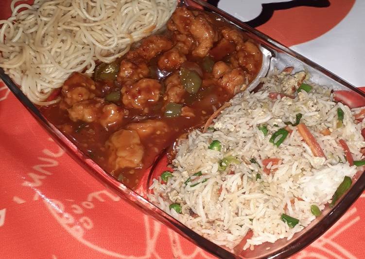 Chicken Manchurian with egg fried rice and herb noodles