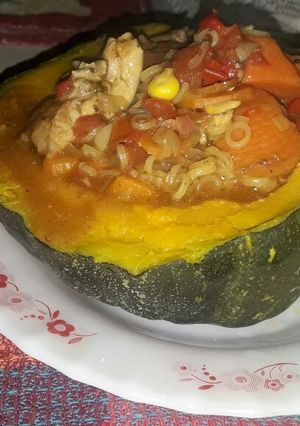 Una foto de Guiso adentro de un zapallo