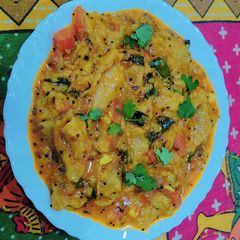 Sindhi Seyal Phulka (Leftover roti in garlic tomato curry) A picture of Sindhi Seyal Phulka (Leftover roti in garlic tomato curry).