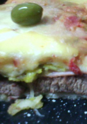 Una foto de Pizza lomo