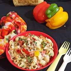 A picture of Macaroni in Mushroom and bell pepper sauce.