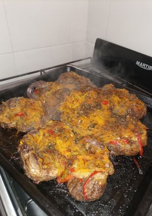 Una foto de Osobuco al horno con arroz