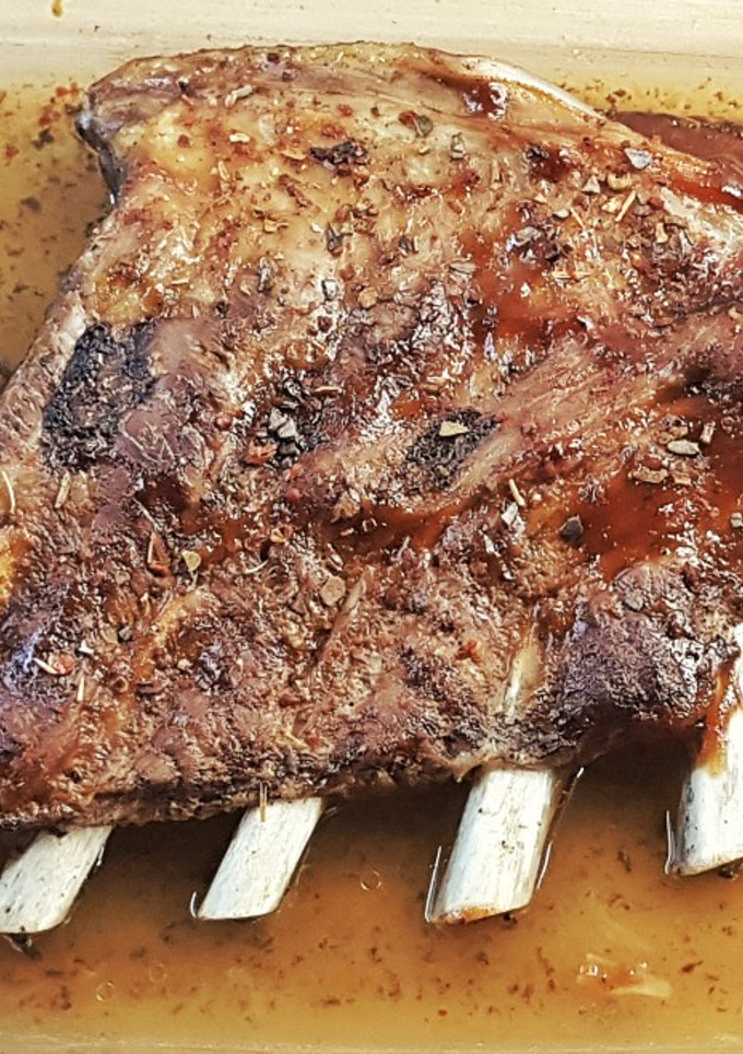 Una foto de Tajine de costillas de cerdo a la cocacola y especias Otomanas