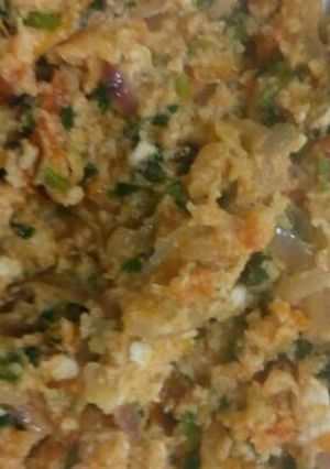 A picture of Scrambled eggs with cheese.