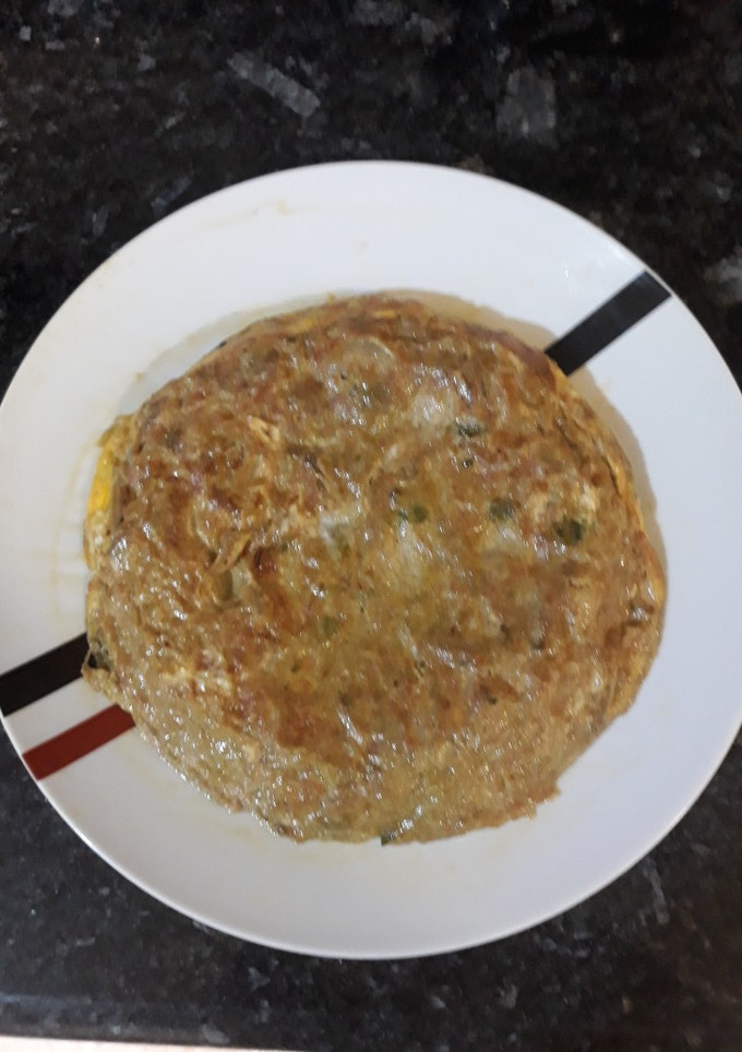 Una foto de Tortilla de cebolla con alcachofas