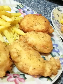 Una foto de Buñuelos de merluza con patatas