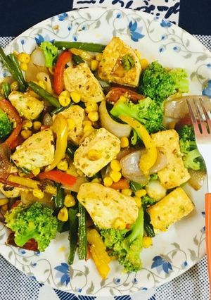 A picture of Sweet corn paneer and broccoli stir fry.