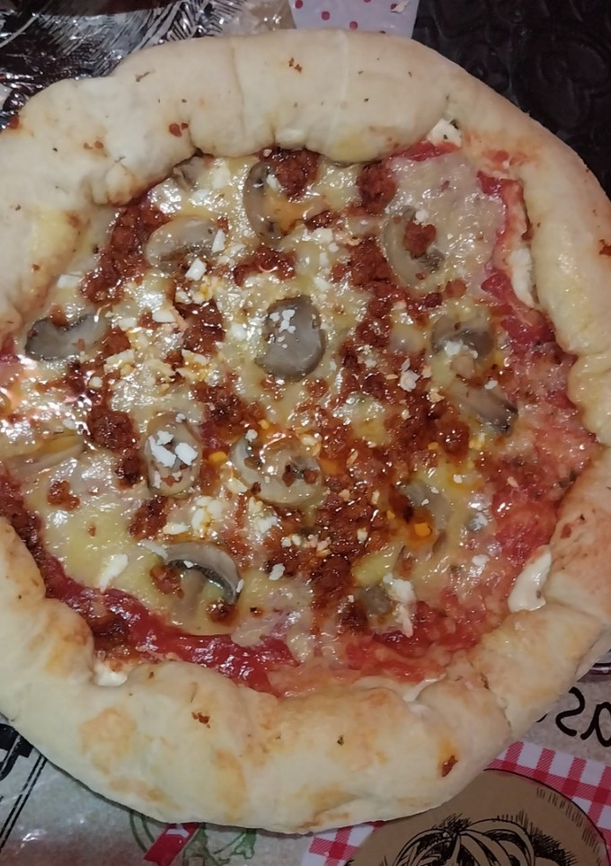 Una foto de Pizza de todo un poco