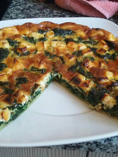 Una foto de Quiche de espinacas y ajitos tiernos