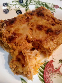 Una foto de Canelones de Cuaresma con salsa de frutos secos