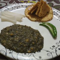 A picture of चने का साग,मक्के की रोटी.