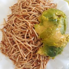 A picture of Spagetti with avacado.
