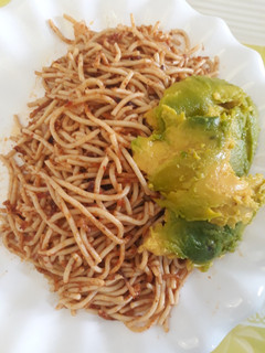 A picture of Spagetti with avacado.