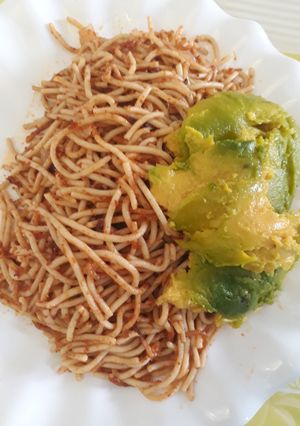 A picture of Spagetti with avacado.