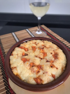 Una foto de Enchilada de pollo y queso