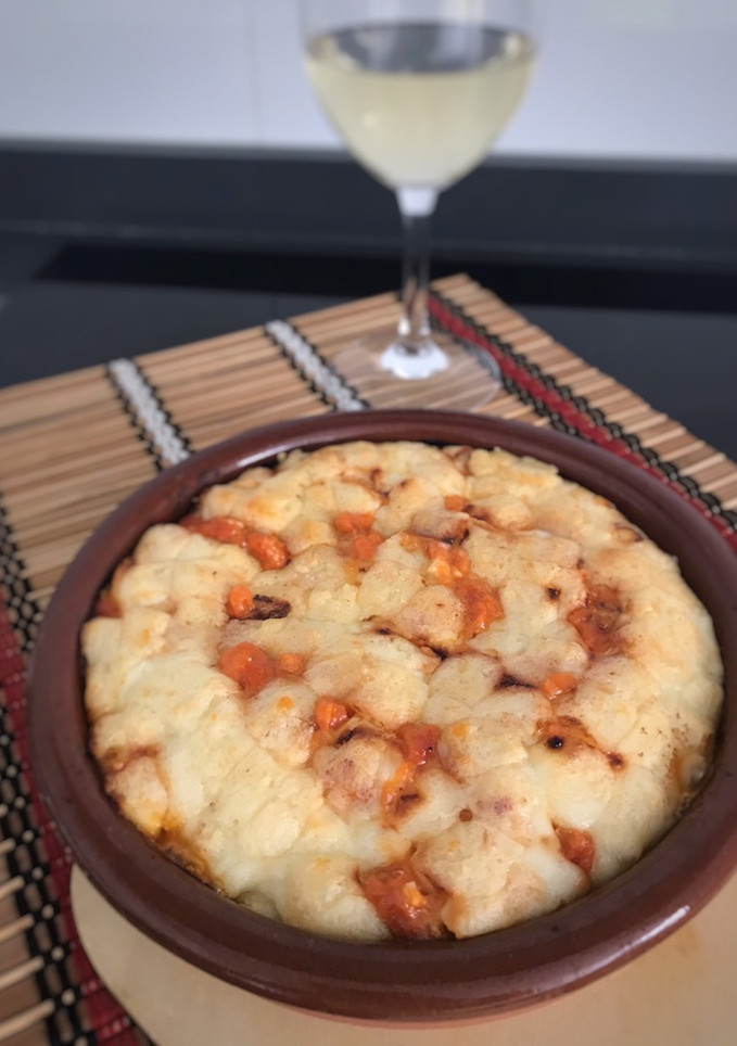 Una foto de Enchilada de pollo y queso