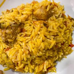 A picture of Palm oil Jollof Rice.