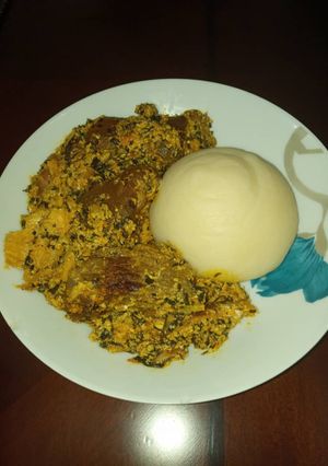 A picture of Egusi soup and Semivita.