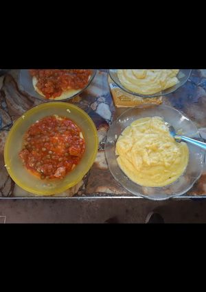 Una foto de Polenta con tuco o blanquita con quesito 😍