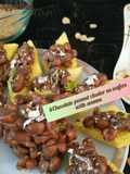 Chocolate peanut cluster on wafers with sesame