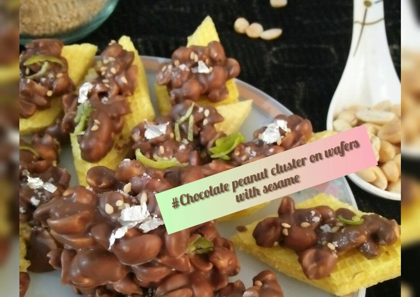 Chocolate peanut cluster on wafers with sesame