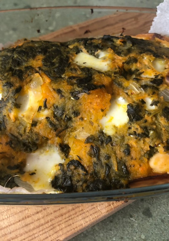 Una foto de Calabaza rellena de espinacas y garbanzos